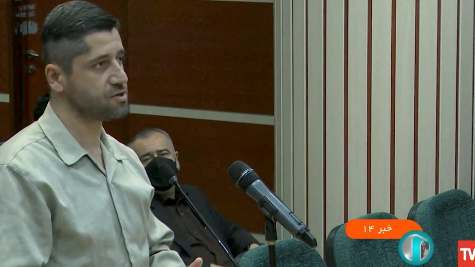 Mohammad Hosseini standing in court
